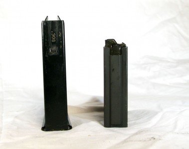 A 10 round AR-10B magazine (Right) is next to a standard 10 round AICS magazine to show the size difference between the two. Both are made from steel carry the same number of rounds but the AR-10B magazine is only a little wider and much shorter. A 15 round AR-10B magazine would probably be about the same dimensionally as the AICS magazine.
