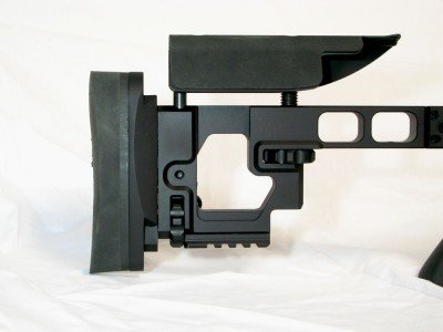 Here you can see a detailed shot of the Armalite Target Stock with adjustments for cheek height, length of pull, and adjustments to raise and lower the recoil pad. The thumbwheels have a ball detent that keep the adjustments in place while shooting and also provide a tactile reference when turning the knobs. The cheek piece is made from metal but has a rubber pad adhered to it that provides adequate padding and a nice non-slip surface. Also notice the cut outs in the right side of the cheek piece, that is to allow the bolt to be removed only when the safety is on. In addition to those features the stock has pre-threaded attachment points for sling swivel studs and a Picatinny rail bottom to attach other sling swivels or a monopod. 