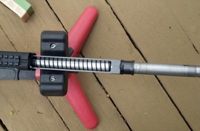 Affordable Gobbler Guns and Gear: Tristar's Raptor ATAC—New Shotgun Review The gas piston drives the action arms back to eject the spent round and cock the hammer. The recoil spring drives the action arms forward to chamber the next round and lock the bolt in battery.