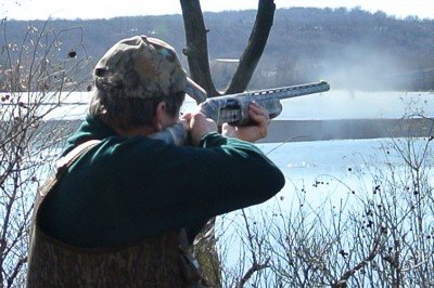 Mossberg Duck Commander 930—New Gun Review The 930 throwing some steel out over a half-frozen lake.