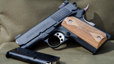 The 1911 U is a stunning blend of aluminum, steel, wood and nickel.