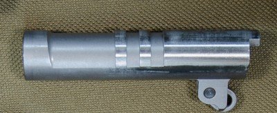 Magnum Research Desert Eagle 1911 Undercover—A Tiny But Mighty Pistol Close-up of the 11-degree muzzle crown, and traditional barrel lugs.