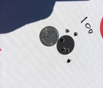100 yards with Lake City M855. No, the quarter is not covering any other shot holes. I meant to shoot only five rounds. 