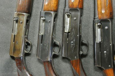 From left to right: Early Remington Model 11 12-gauge with the original style safety, later Remington Model 11 in 20-gauge, Browning Auto 5 in 12-gauge magnum and a Browning Auto 5 in 20-gauge.