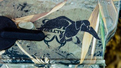 Mossberg 715P Duck Commander – Maybe the Coolest Plinker Ever - New Gun Review The Duck Commander logo and the Realtree logo are both visible on the pistol.