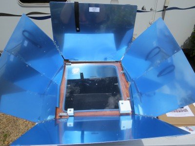 This is how The Sun Oven comes out of the box. The metal wings have a blue coating on them. 