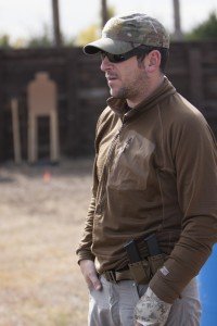 Picture 1 – The author about to shoot a one-day handgun course just three days after breaking his hand. Notice the Ares Gear Ranger belt and tactical Coban wrapped cast. 