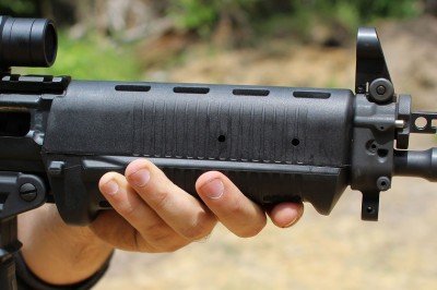 The forend is a handful. With the added sections of rail, it gets even larger. Still, it has ergonomic contours, and you can hold thumb-over-bore if you want.