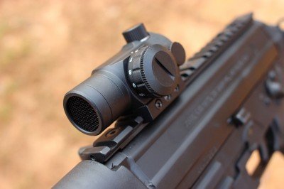 The optic’s brightness is easily adjusted, and it comes with a honeycomb shade to knock back glare.