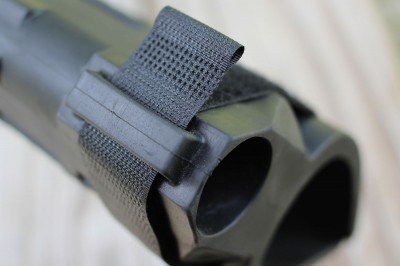 If you want the Velcro strap out of the way, it tucks neatly in the top of the brace.