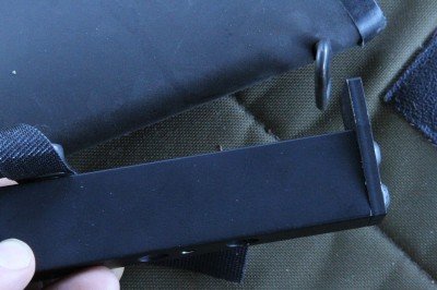 The ear on the support slips into the sling loop, then you use the Vecro strap to secure the monopod. 