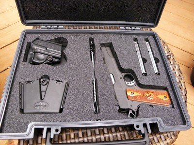 In addition to a rugged fitted case, the Range Officer includes a paddle holster, dual mag carrier, and cleaning brush.