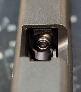 The SureStrike laser cartridge installs in the breech of the barrel, not the front. This prevents any possibility for live ammo to be loaded into the gun.