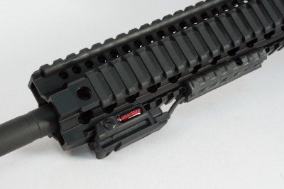 The LaserMax UNI-MAX mounted on the bottom rail is low profile and does not interfere with shooting from a rest.