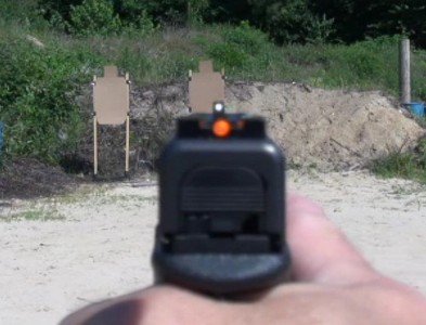 Laser Ammo recommends a "dot over dot" sight picture with a six o'clock hold.