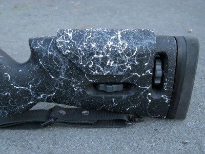 This shows the MMR stock's adjustable cheek piece and length of pull thumbwheels.