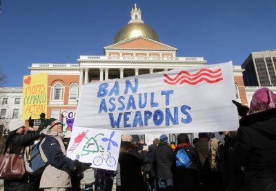 (012613 Boston, MA) People hold signs during a rally of One Million Moms for Gun Control in front of the Massachusetts Statehouse in Boston, Saturday, Jan. 26, 2013.    Photo: Chitose Suzuki