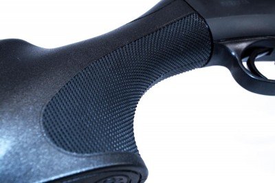 The entire grip area is well checkered.