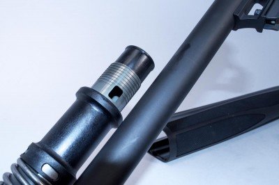 The factory leaves a plug in the magazine tube, limiting you to two rounds, do you'll probably want to remove that. Just take the fore end off and remove the magazine tube cap to get it out.