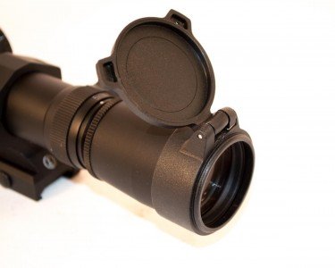 The Leupold includes sturdy flip up caps.