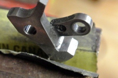 Edge filed off, still needs polish.