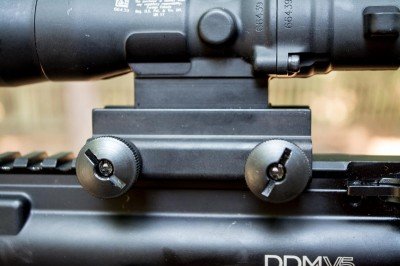 The Trijicon includes a built-in rail mount.