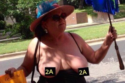 One of the topless pro-gun control supporters (Photo: Buzzpo)