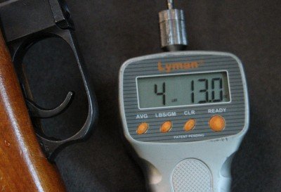 The green scoped rifle's stock trigger was a little lighter, but has over an inch of takeup and drag before breaking. 