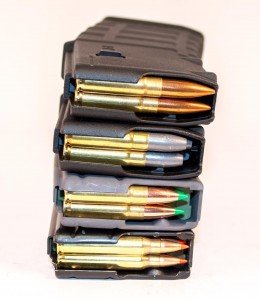 Notice how the magazine ribs support the cartridge case necks with the .223 Remington cartridges on the bottom. The ribs touch different parts of these various 300 Blackout projectiles directly.