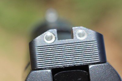 Beneath the dots is a flat black panel that some shooters find easier to use for slower precision shots.