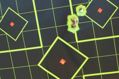 With the laser aimed here, shots hit high right, but close enough to be deadly.