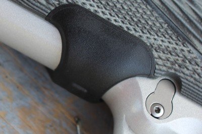 The pad requires a good grip before it shines. Typical holstering of the gun won't turn it on.