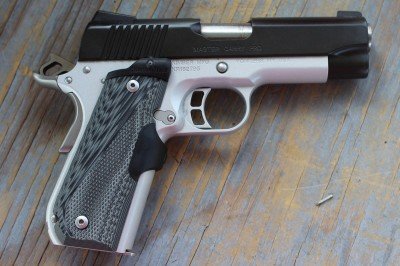 The rear sight is a traditional pyramid shape, which means it won't snag, but it would be hard to use for one handed charging. 