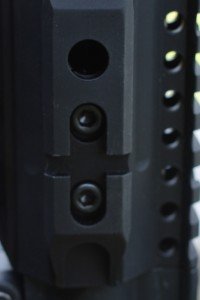 The forend connects to the barrel nut with several hex screws. 