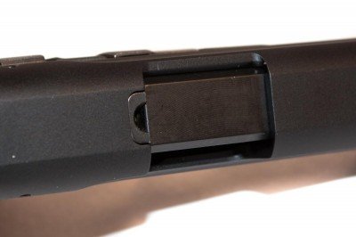 The loaded chamber indicator is a small cutout in the top of the slide that allows visual check of the chamber status.