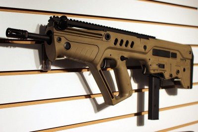 Top 5 Guns to Defend Against Looters The Tavor even has a 9mm conversion kit now that turns the rifle into a pistol caliber carbine.