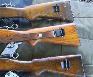 The top rifle is the old gun. The beech stocks on many of the old guns have worn away for some reason.  The second gun is the new unissued beech rifles, and the bottom is the walnut stock. 