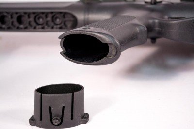 Beretta's ARX100: A Closer Look The grip offers a storage area. The bottom secures with a spring snap, but is easy to open using, you guessed it, a bullet tip.