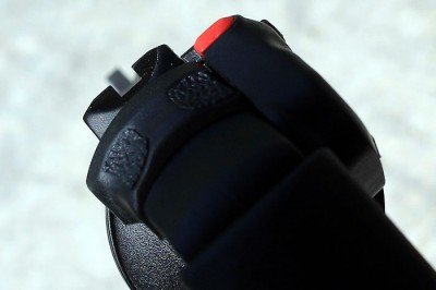 The black on black sights are difficult to see in the dark, but the laser makes up for that. 