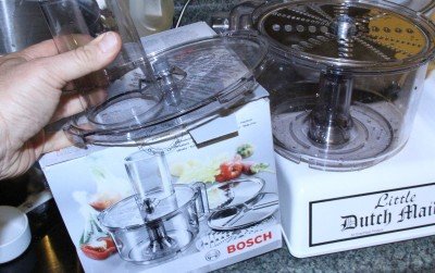The food processor bowl and cutters come in an actual Bosch box and have been retrofitted to the old gearing. 