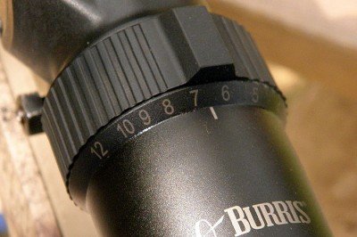 The Eliminator is variable from 3 power to 12 power with a knurled ring. The Raised bar aids in making quick adjustment and to overcome the drag of the seals.