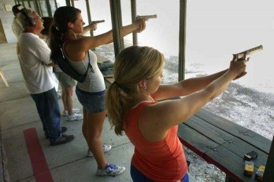 Women shooting at a gun range!   Don't freak out, and don't annoy them.  (Photo Jacksonville.com)