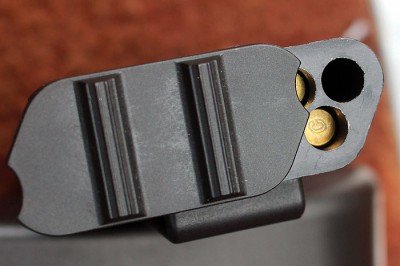 The Marbles Catch .22 has a slight cut out in the lid that blocks unwanted rounds from escaping.