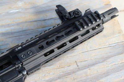 The Perfect Package: PWS's MK107P The 7.5 inch barrel is short, but long enough. The flash hider disipates the flash well, but not the noise.
