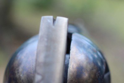 The rear sight is simply ground into the hammer. No adjustments.