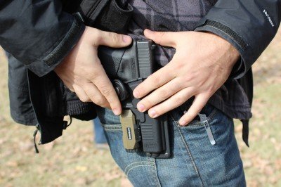 Fobus's Any Light Tactical Holster To lock it down, simply snap it shut.