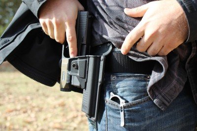 Fobus's Any Light Tactical Holster To get the gun into the holster, I find it easier to push in from the side. This motion caused some concern on the range.