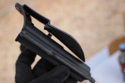 Fobus's Any Light Tactical Holster The paddle grips the inside of the pants below the belt.