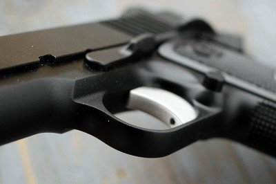The trigger guard has smooth lines.