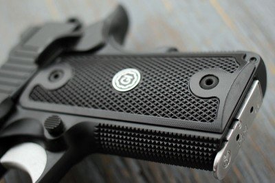 Guncrafter Industries 9mm CCO--Review The grip is very thin, which adds to the concealbility, but the checkering is aggressive.